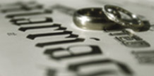 wedding rings on a marriage paper